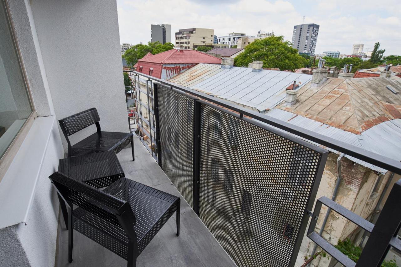 At Central Apartments Bukares Bagian luar foto